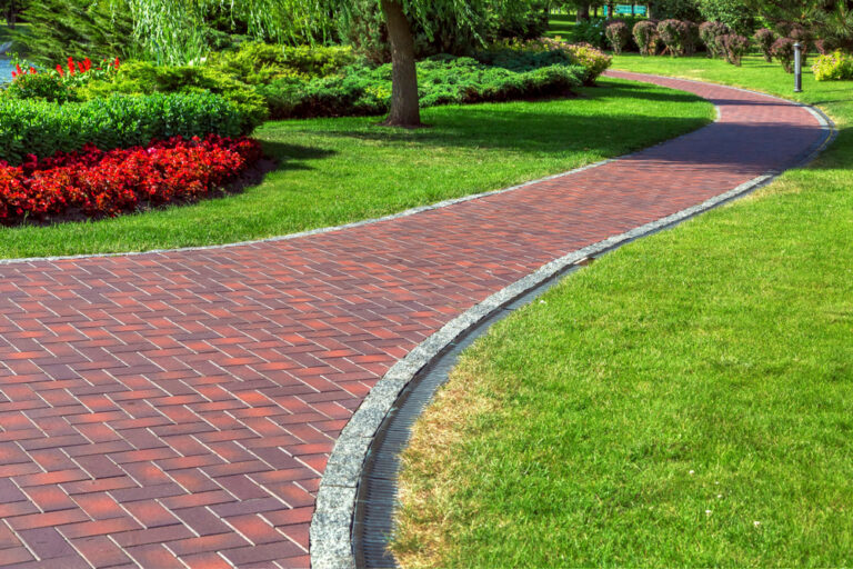 Commercial Drainage System Along Brick Pavement |